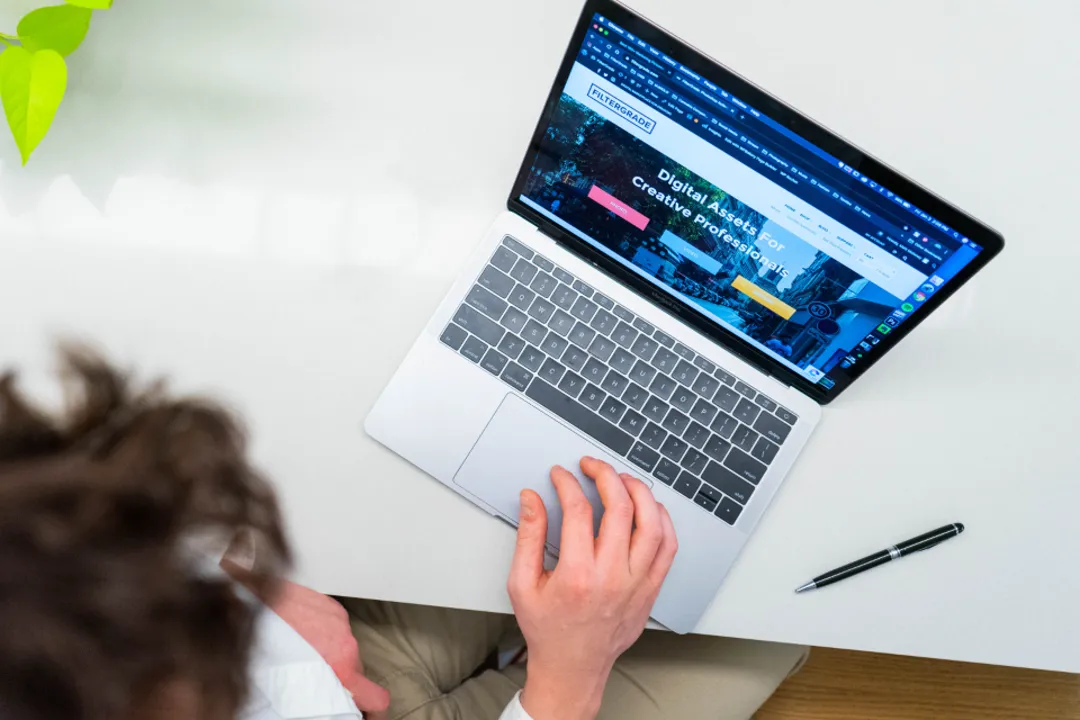 Booking a stay online on a laptop, payment gateway for hotel reservations